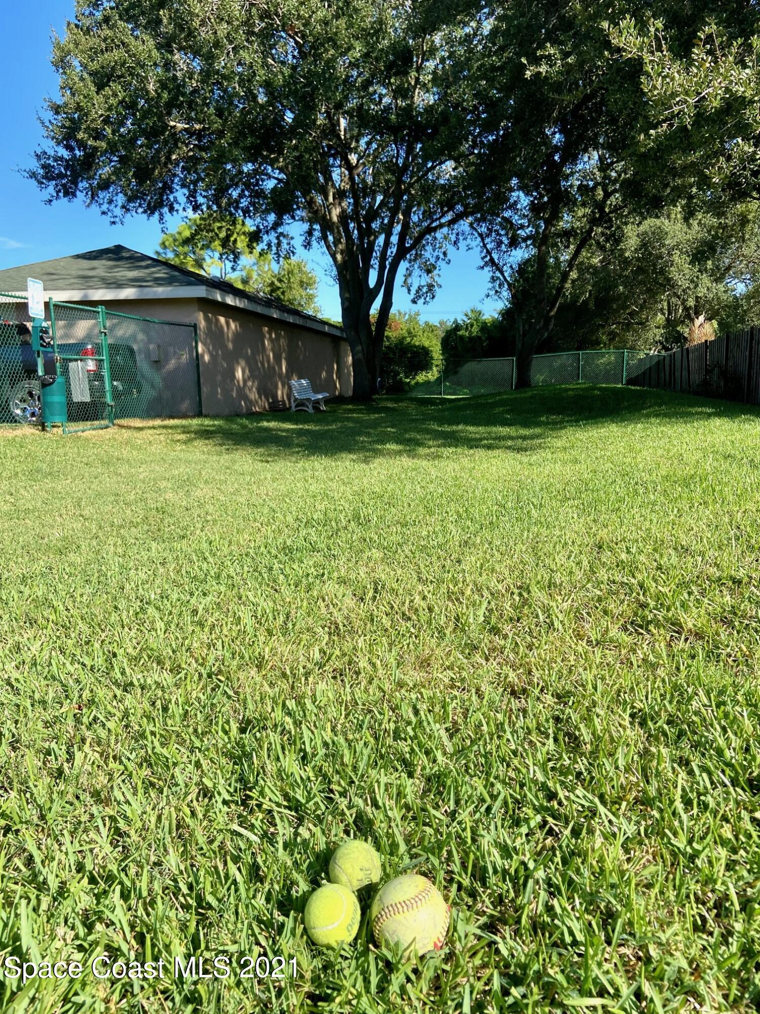 7667 North Wickham Road, Unit # 414 Melbourne, FL 32940 - Photo 24 of 24 Dog Park