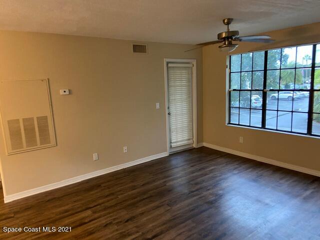7667 North Wickham Road, Unit # 414 Melbourne, FL 32940 - Photo 4 of 24 Living Room