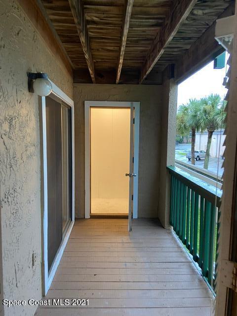 7667 North Wickham Road, Unit # 414 Melbourne, FL 32940 - Photo 10 of 24 Balcony with Extra Storage Closet