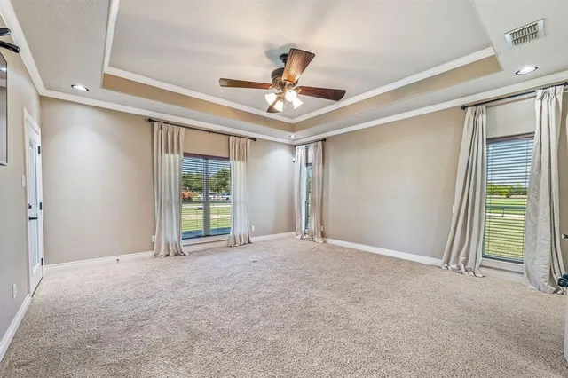 a spacious bathroom with a granite countertop sink mirror and
