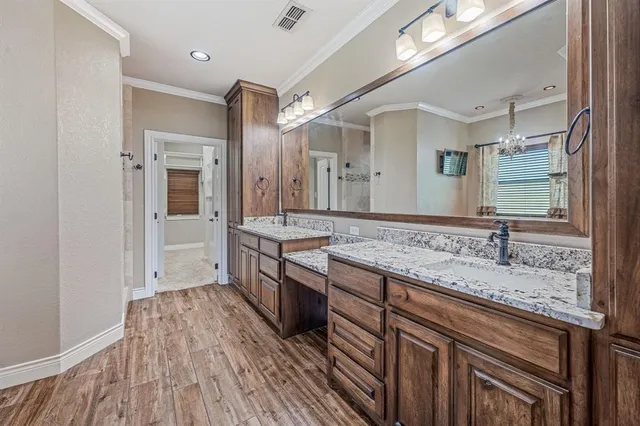 a bath tub sitting in a bathroom next to a window