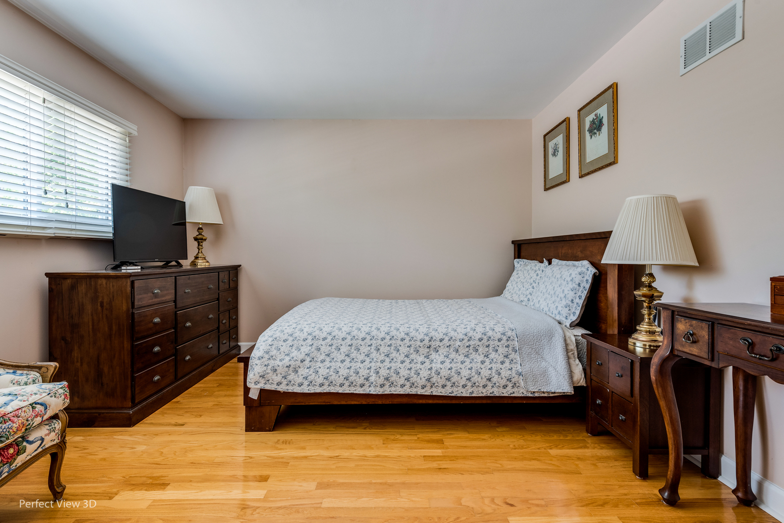 1825 Barberry Road Northbrook, IL 60062 - Photo 11 of 24 a bedroom with a bed and wooden floor