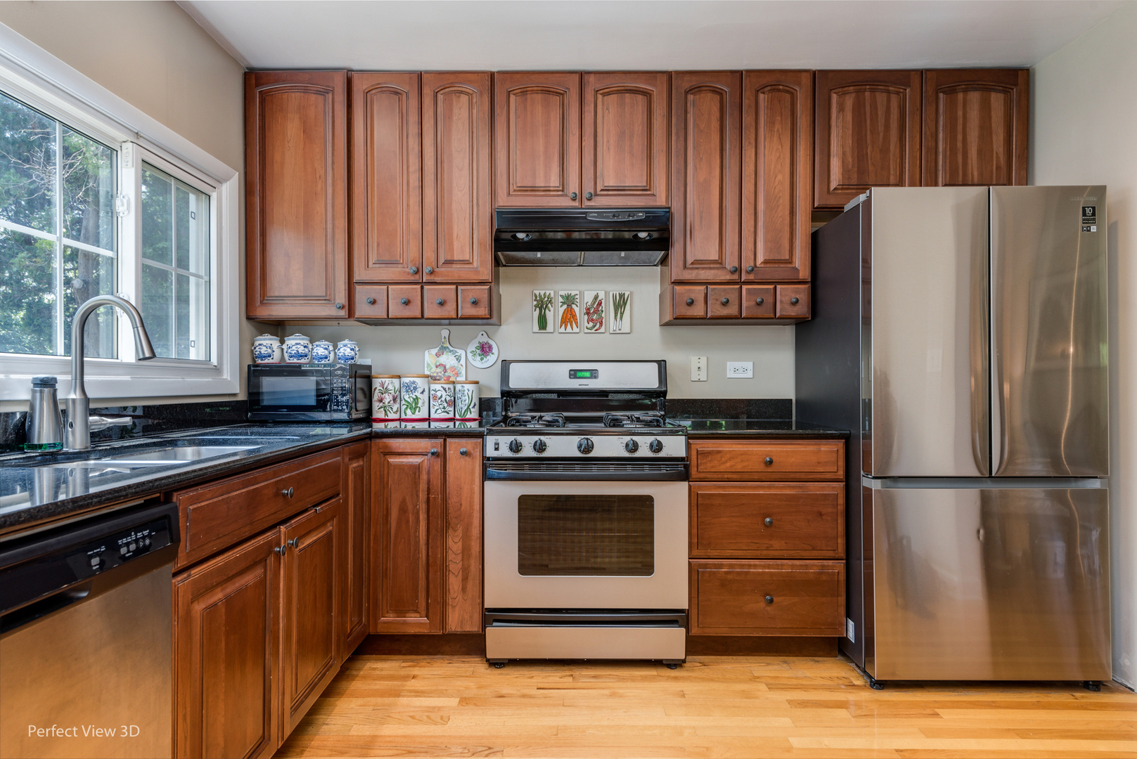 1825 Barberry Road Northbrook, IL 60062 - Photo 20 of 24 a kitchen with granite countertop wooden cabinets and a stove top oven
