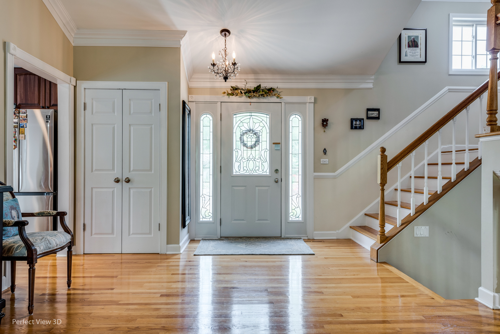 1825 Barberry Road Northbrook, IL 60062 - Photo 2 of 24 a view of a hallway with wooden floor and staircase