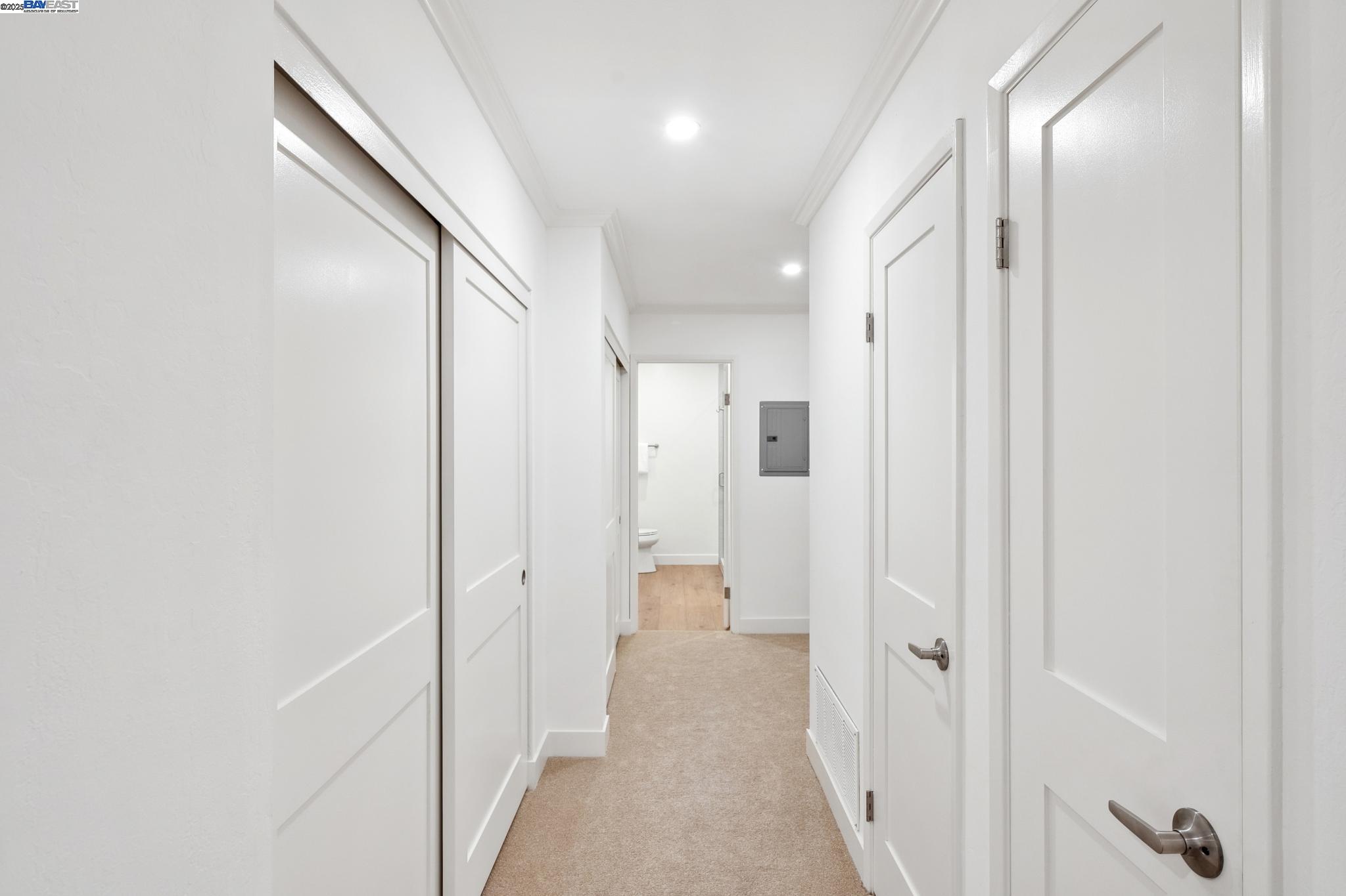 4033 Terra Granada Drive, Unit 5C Walnut Creek, CA 94595 - Photo 20 of 44 a view of a hallway with white walls