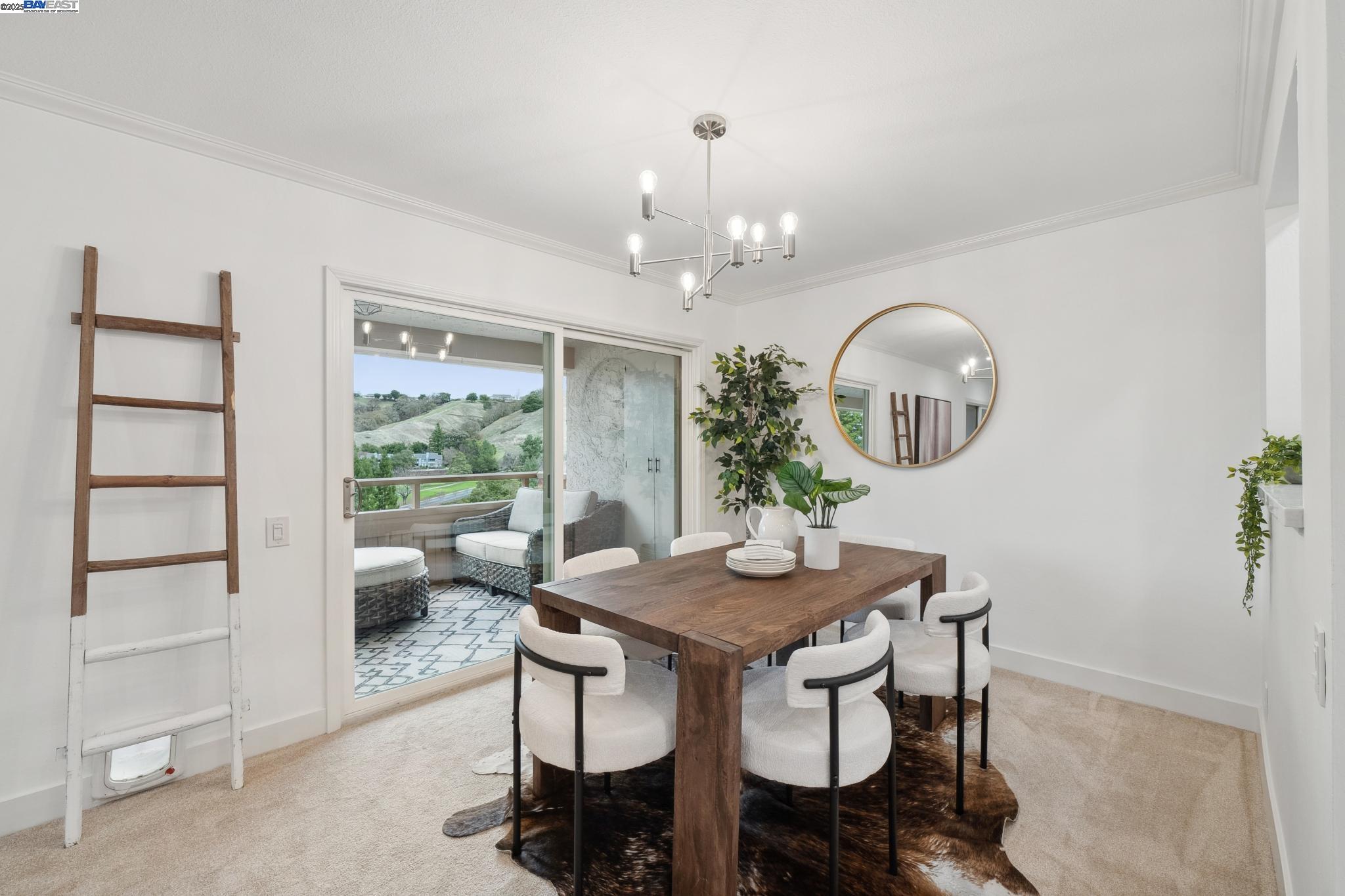 4033 Terra Granada Drive, Unit 5C Walnut Creek, CA 94595 - Photo 9 of 44 a view of a dining room with furniture and a chandelier