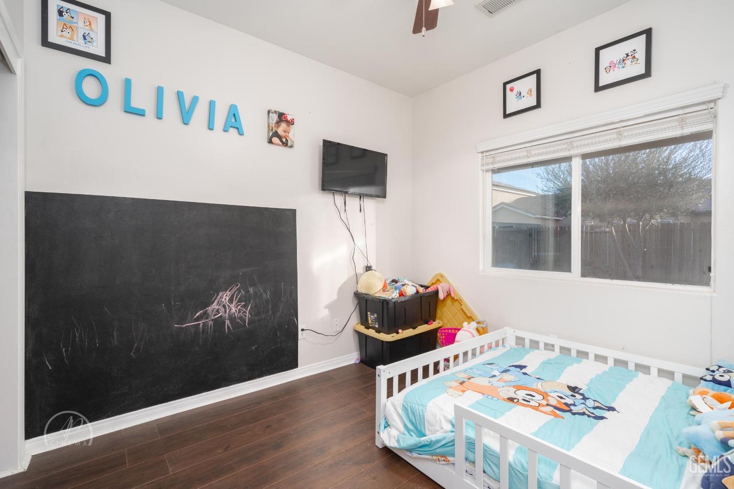 Undisclosed Address Bakersfield, CA 93312 - Photo 13 of 20 a living room with furniture and a fireplace