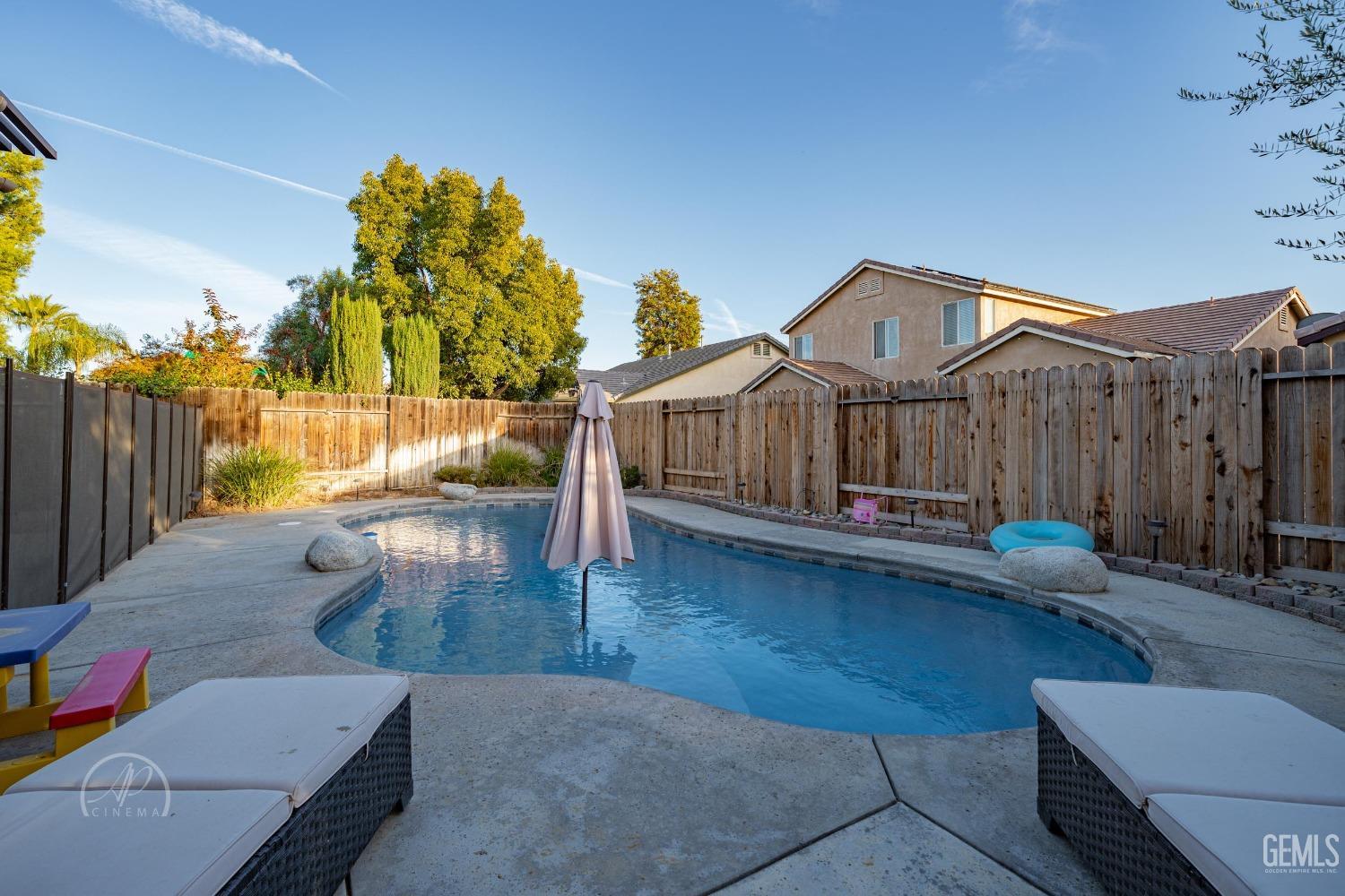 Undisclosed Address Bakersfield, CA 93312 - Photo 17 of 20 a view of a house with backyard and sitting area
