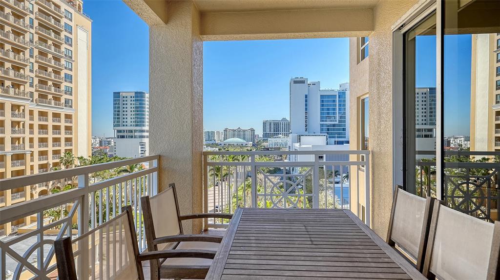 35 Watergate Drive, Unit 806 Sarasota, FL 34236 - Photo 16 of 67 a view of a balcony with chairs