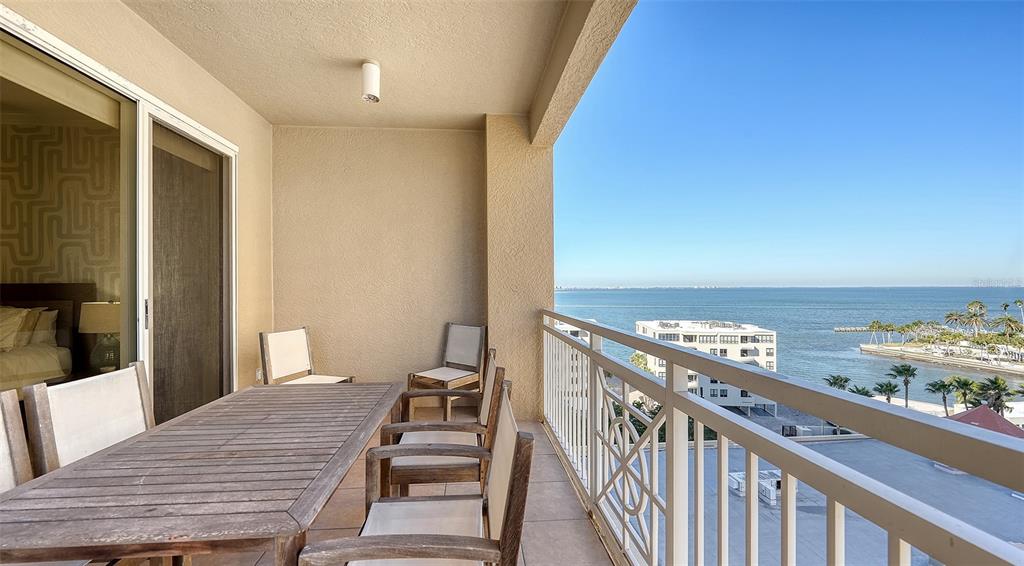 35 Watergate Drive, Unit 806 Sarasota, FL 34236 - Photo 17 of 67 a view of a balcony with wooden floor