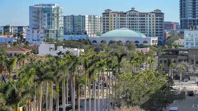 a view of living room with furniture and window