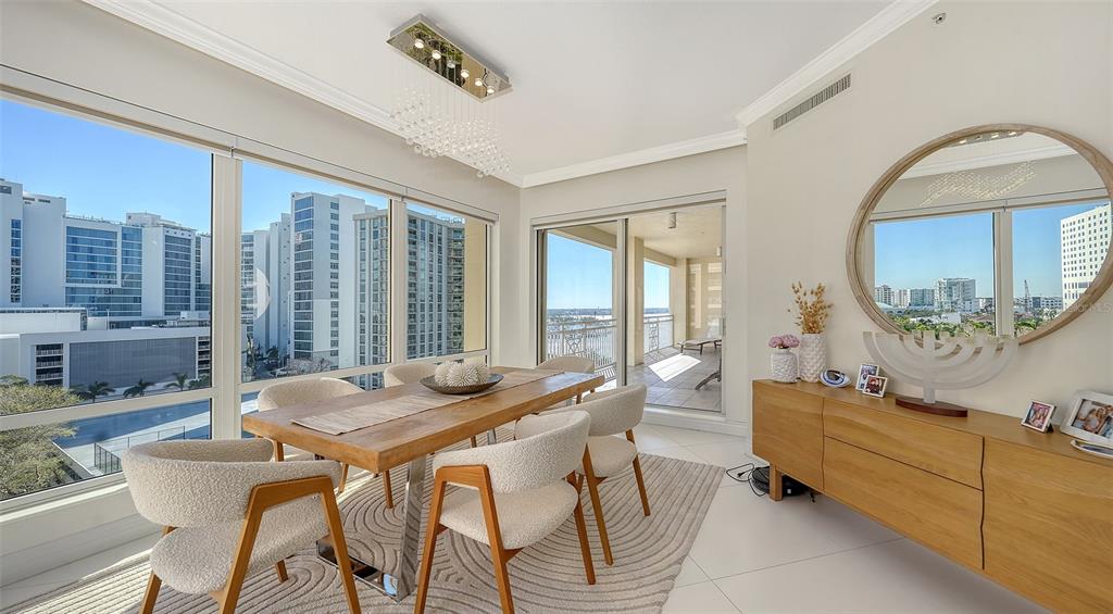 35 Watergate Drive, Unit 806 Sarasota, FL 34236 - Photo 34 of 67 a living room with furniture and a large window