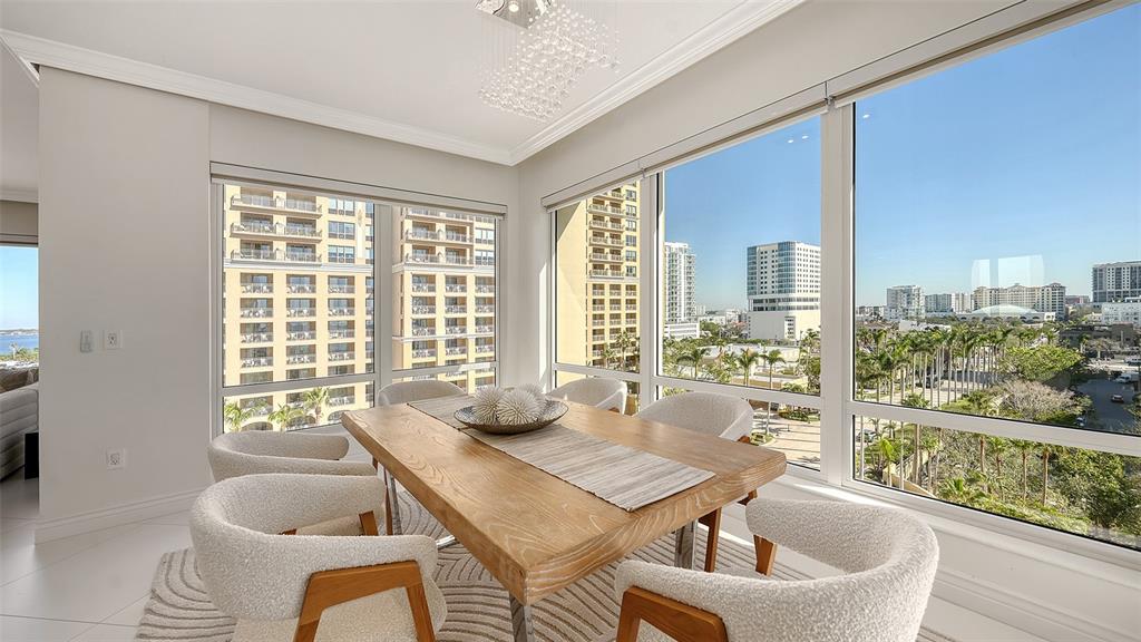35 Watergate Drive, Unit 806 Sarasota, FL 34236 - Photo 36 of 67 a dining room with furniture and window