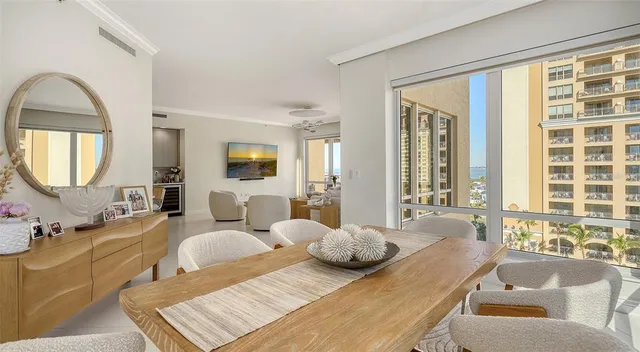 a bathroom with a tub a sink shower and mirror