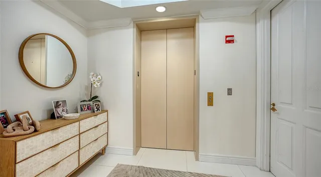 a view of a hallway with a white walls