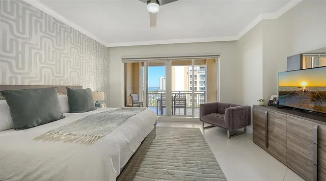 a view of a terrace with a table and chairs