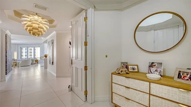 a living room with furniture and white walls