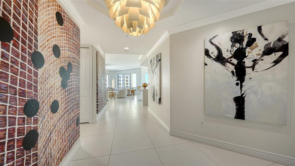 35 Watergate Drive, Unit 806 Sarasota, FL 34236 - Photo 6 of 67 a view of a hallway with a white walls