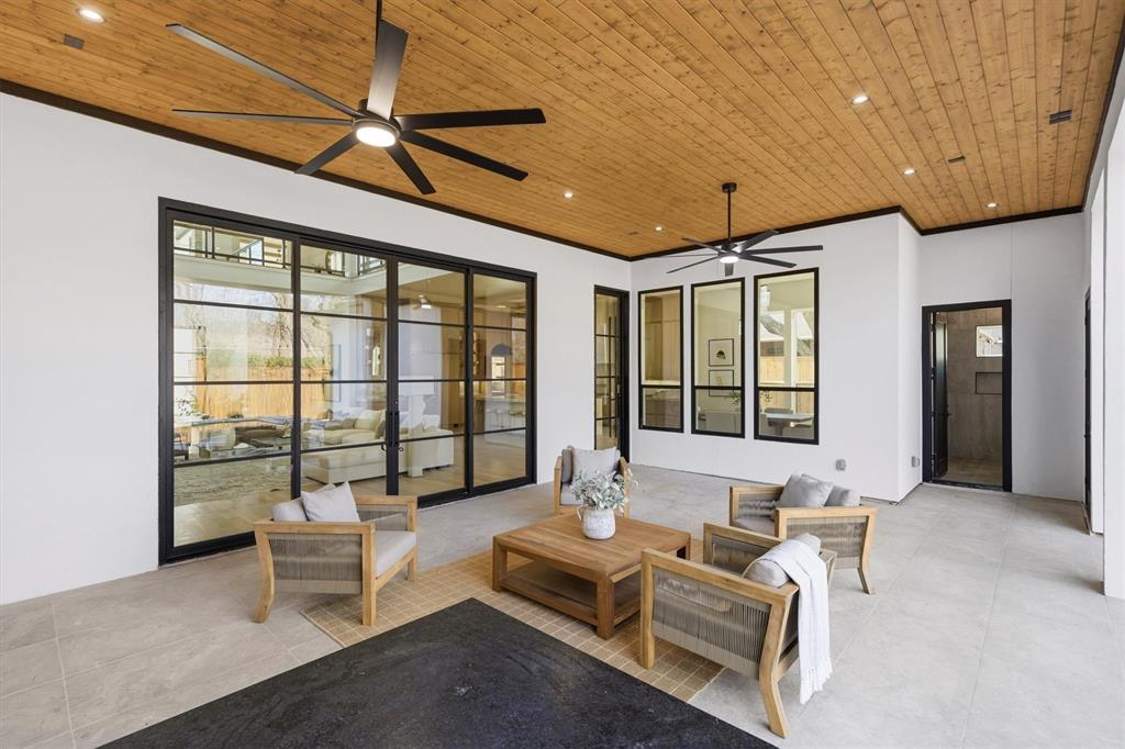 6257 Turner Way Dallas, TX 75230 - Photo 33 of 39 a living room with furniture and a large window