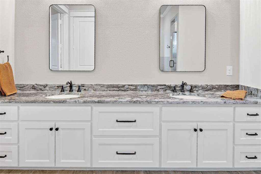 2716 River Path Court Burleson, TX 76028 - Photo 21 of 35 a bathroom with vanity granite and a mirror