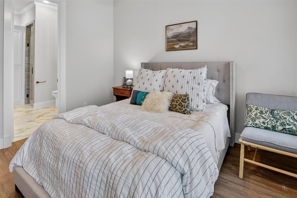 2716 River Path Court Burleson, TX 76028 - Photo 25 of 35 a bedroom with bed and painting on the wall