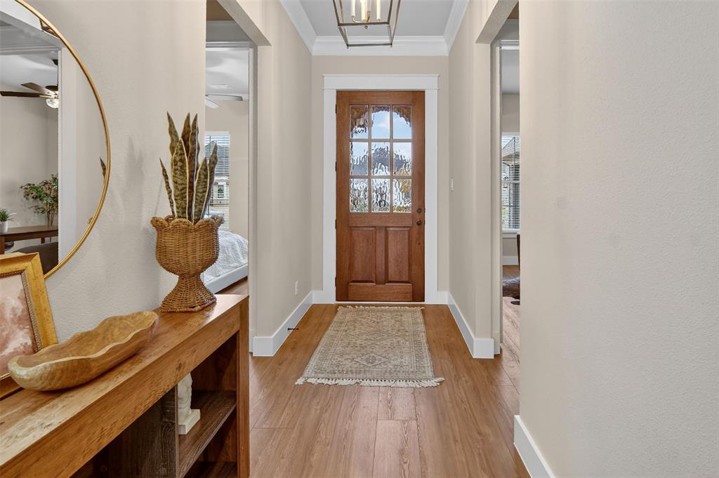 2716 River Path Court Burleson, TX 76028 - Photo 5 of 35 a view of hallway with wooden floor