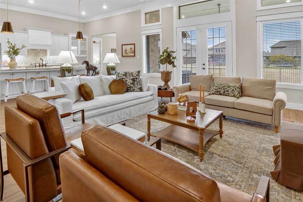 2716 River Path Court Burleson, TX 76028 - Photo 8 of 35 a living room with furniture wooden floor and a kitchen view