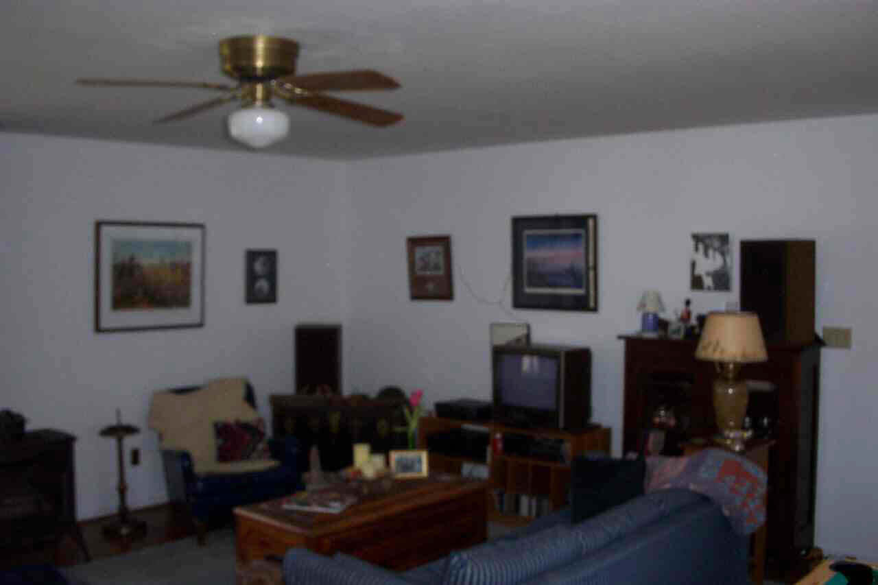 1870 Hamilton Road Louisa, VA 23093 - Photo 4 of 4 a living room with furniture and a flat screen tv
