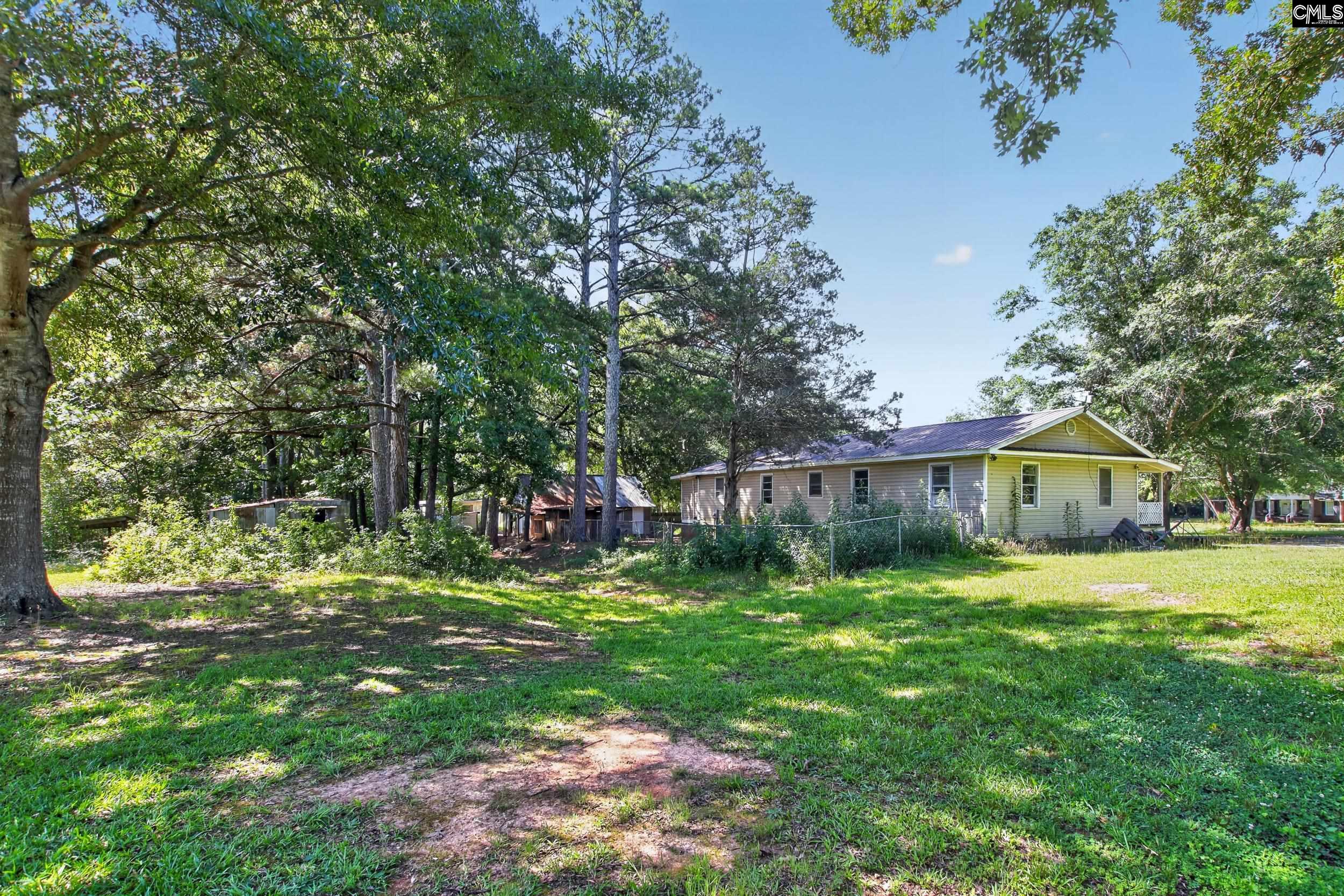 3140 Highway 702 Chappells, SC 29037 - Photo 29 of 39 a view of a yard in front of the house