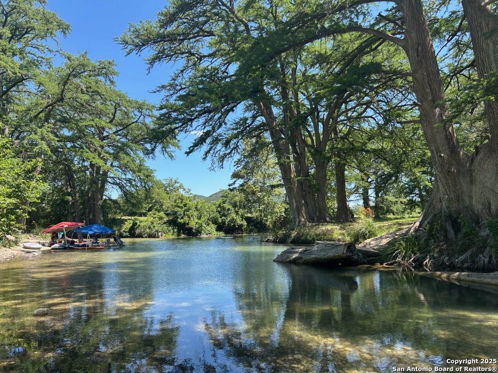 143 Taff Leakey, TX 78873 - Photo 3 of 29 a view of lake with green space