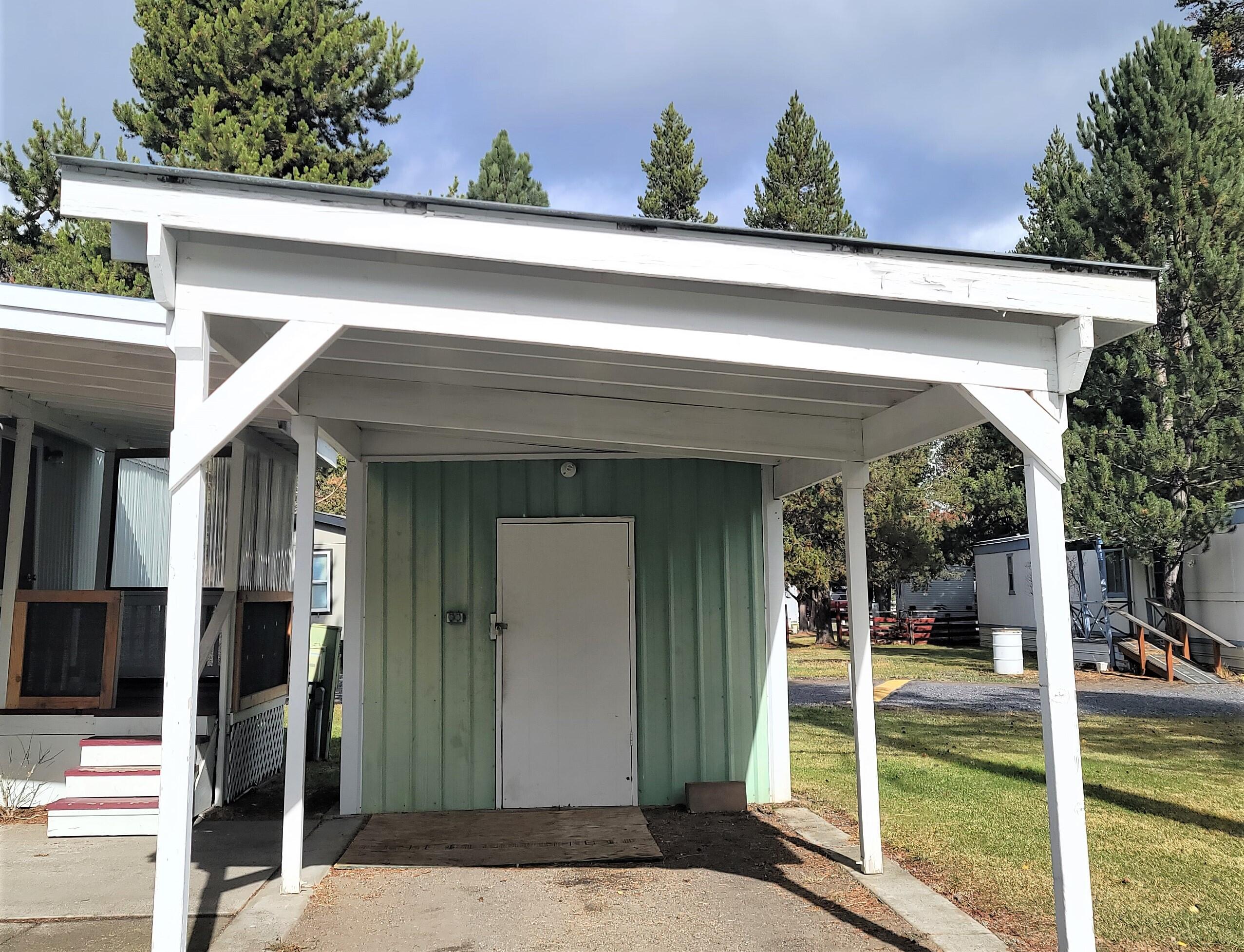 52731 Huntington Road, Unit 29 La Pine, OR 97739 - Photo 20 of 23 Carport with shed