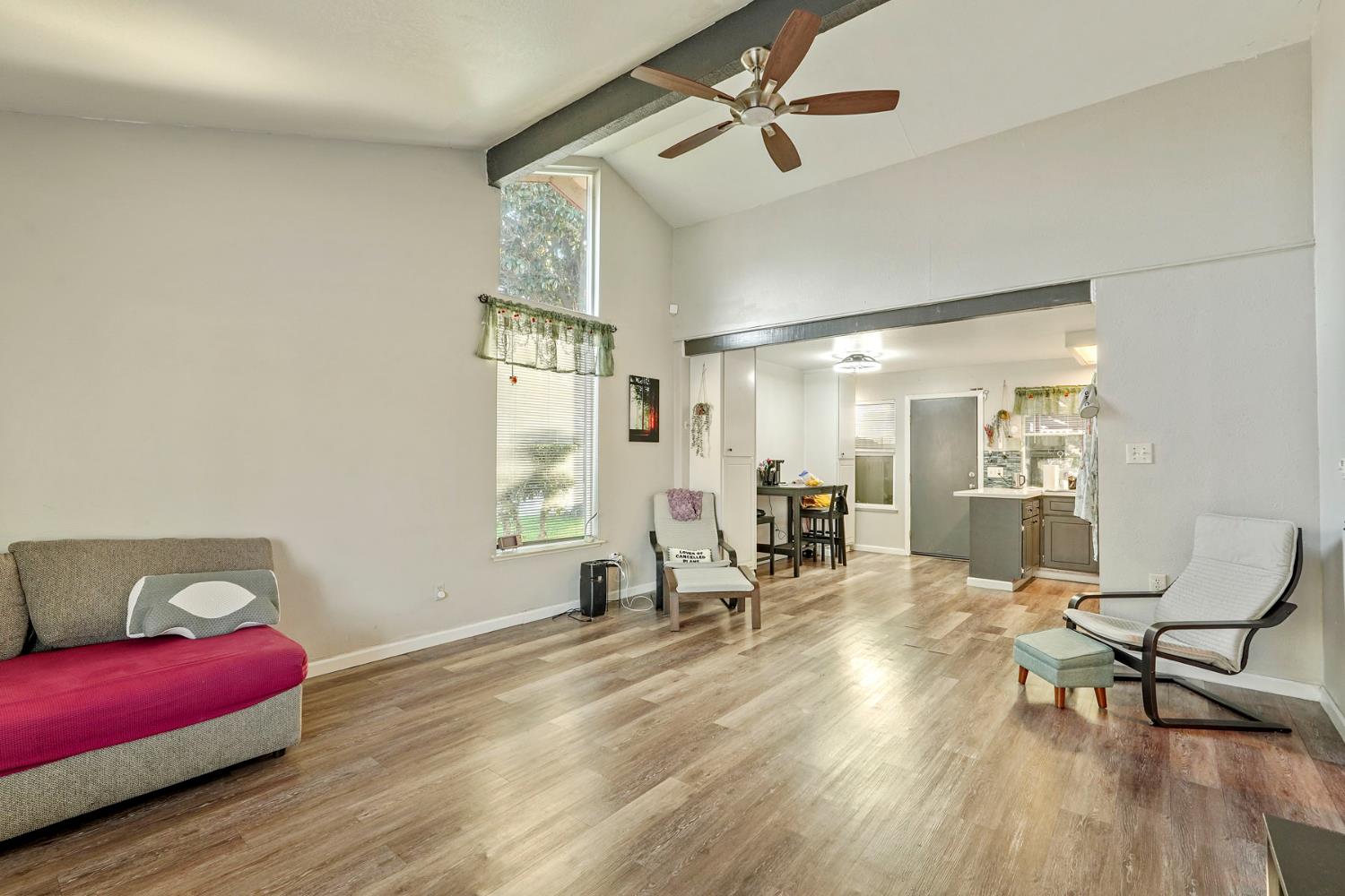 6103 Plymouth Road, Unit 1974 Stockton, CA 95207 - Photo 5 of 13 a view of a livingroom with furniture and a window