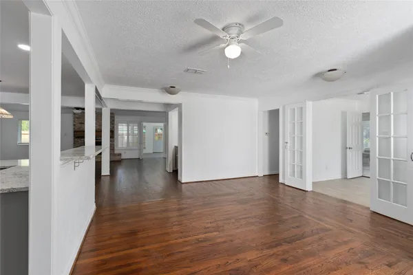 a view of a livingroom with wooden floor