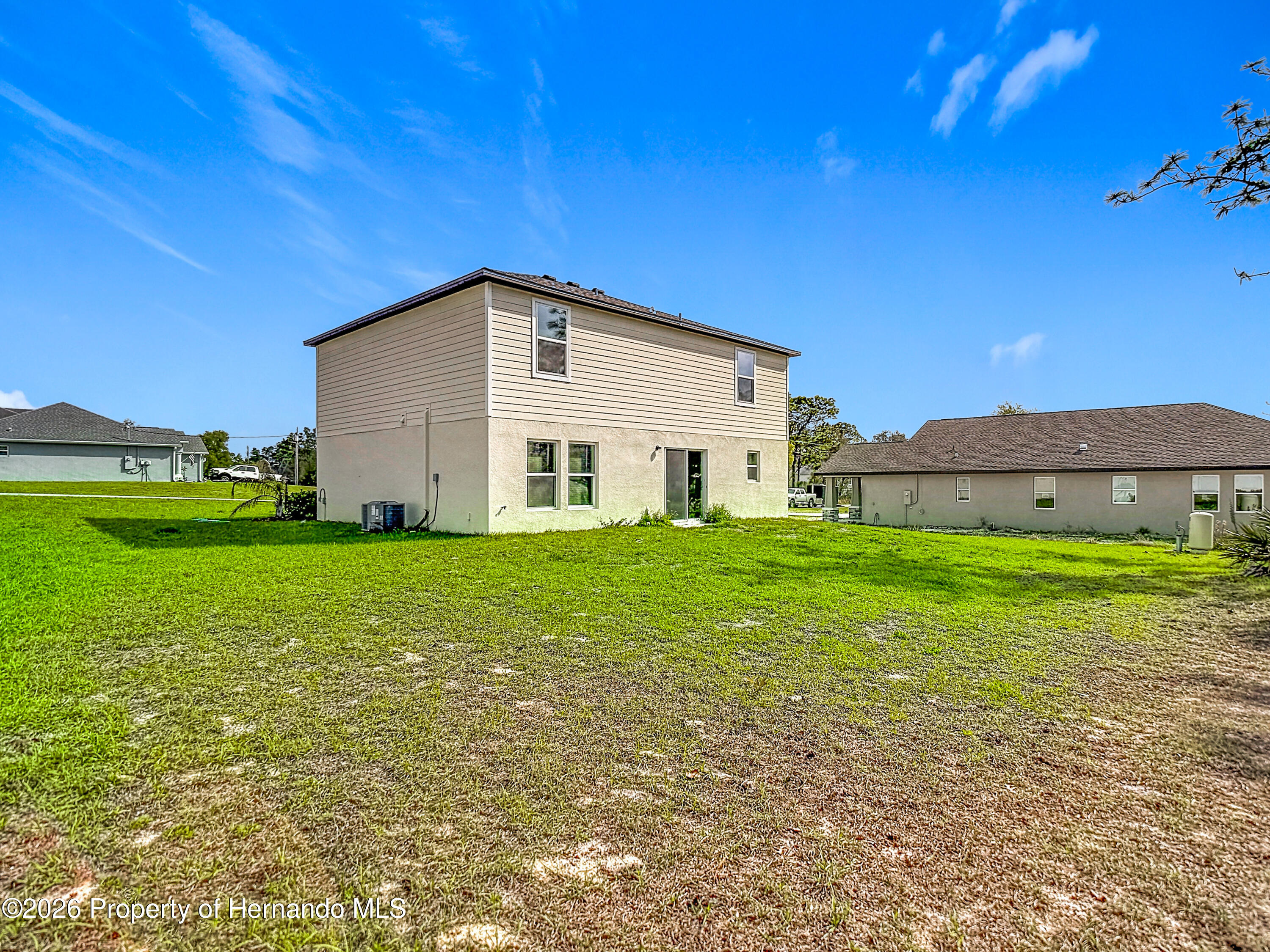 11374 Marcella Avenue Weeki Wachee, FL 34614 - Photo 63 of 70 a house view with a outdoor space