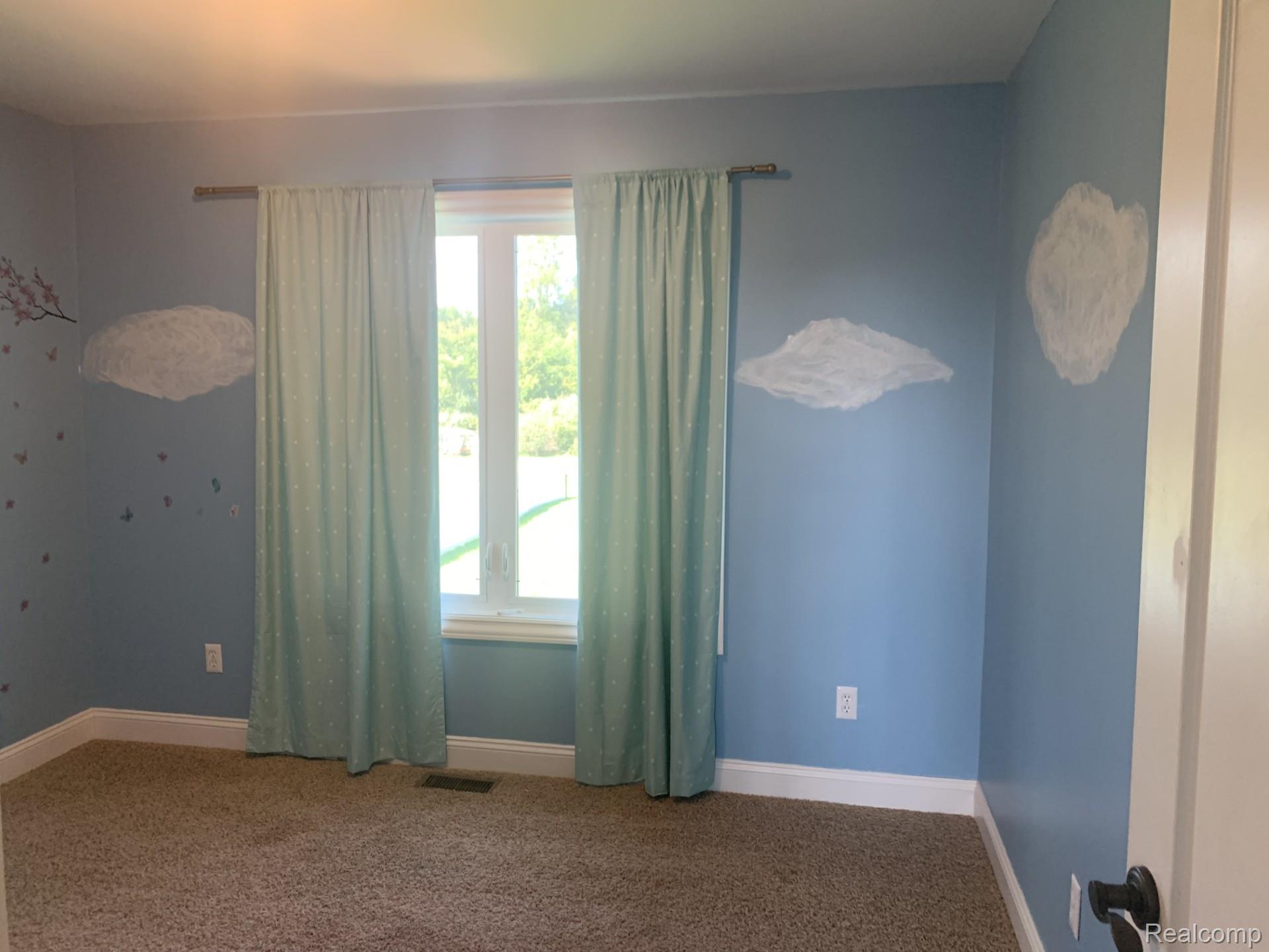 3068 West Cook Road Grand Blanc, MI 48439 - Photo 19 of 31 Window with natural light, wall-to-wall carpeting, and baseboard trim