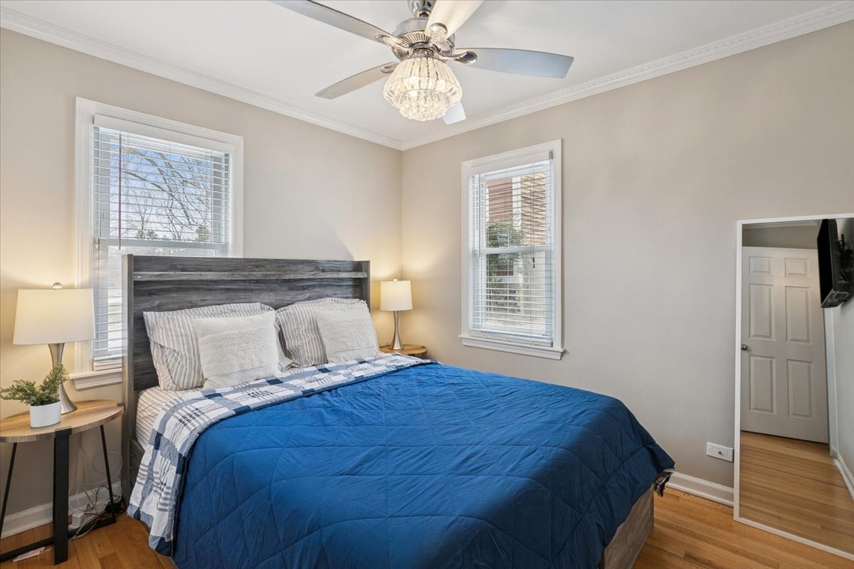 689 East Illinois Road Lake Forest, IL 60045 - Photo 11 of 18 a bedroom with a bed and window