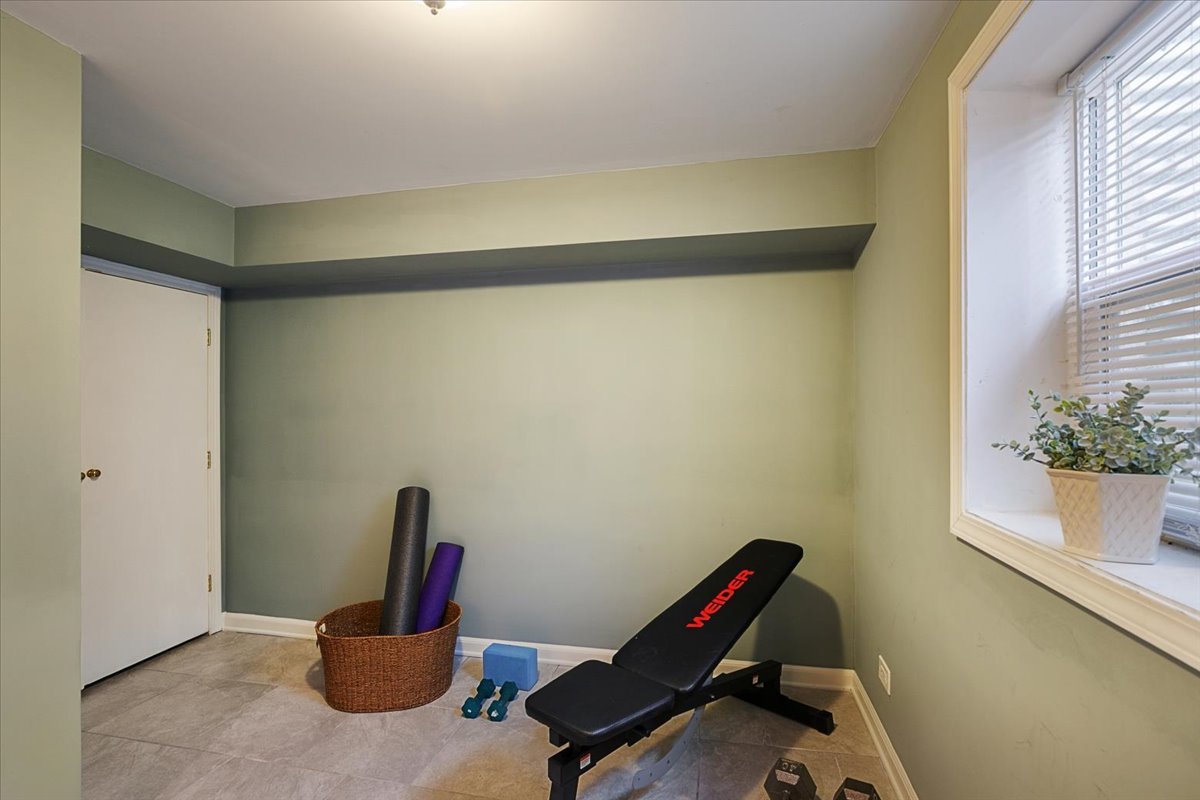 689 East Illinois Road Lake Forest, IL 60045 - Photo 14 of 18 a view of a room with gym equipment