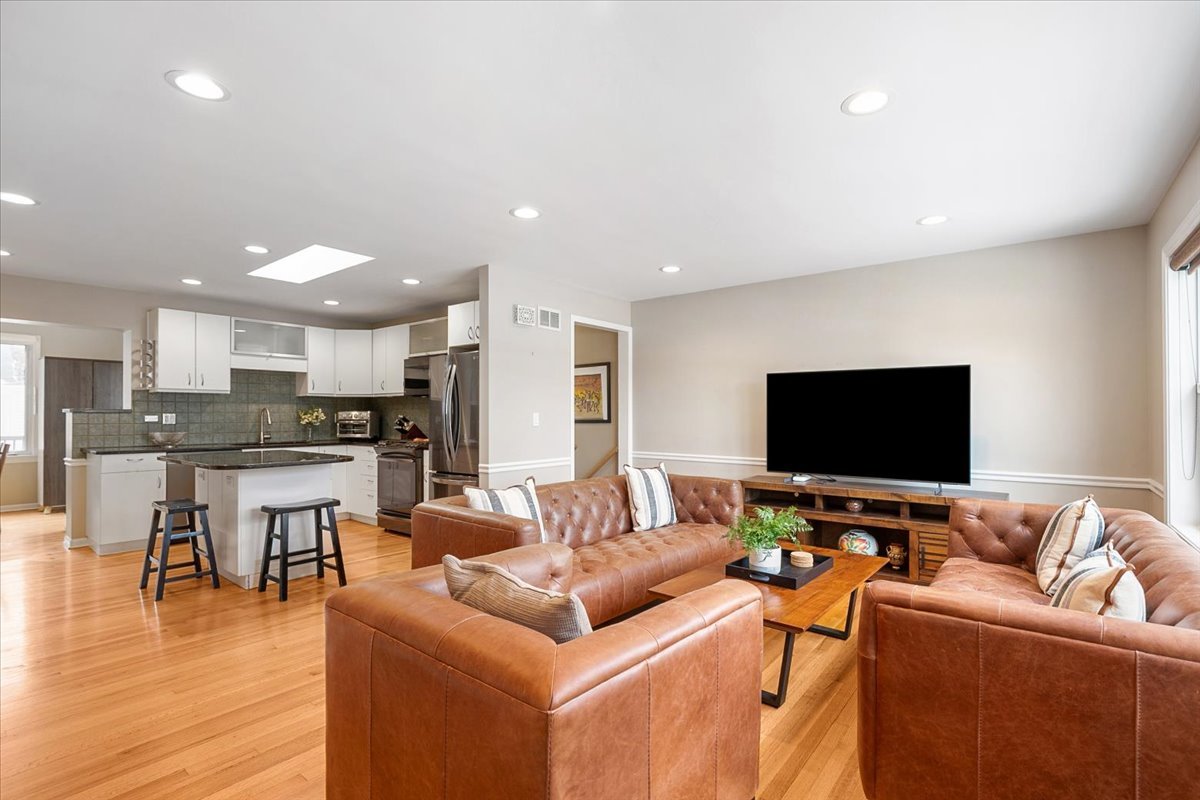 689 East Illinois Road Lake Forest, IL 60045 - Photo 5 of 18 a living room with furniture and a flat screen tv