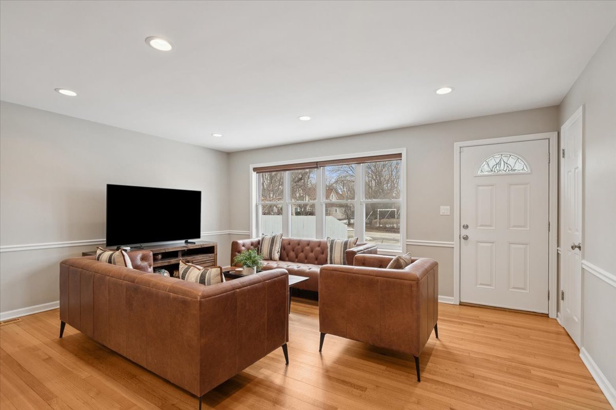 689 East Illinois Road Lake Forest, IL 60045 - Photo 7 of 18 a living room with furniture and a flat screen tv