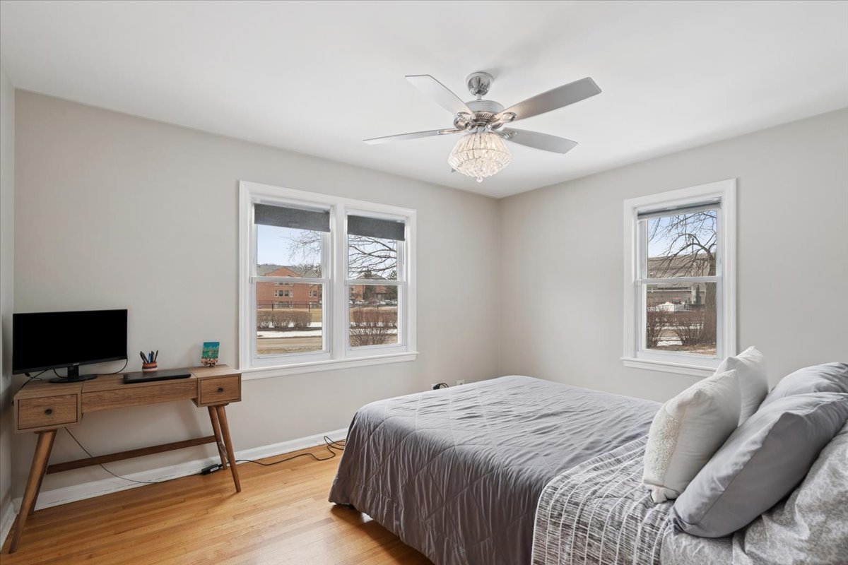 689 East Illinois Road Lake Forest, IL 60045 - Photo 10 of 18 a bedroom with a bed and a window