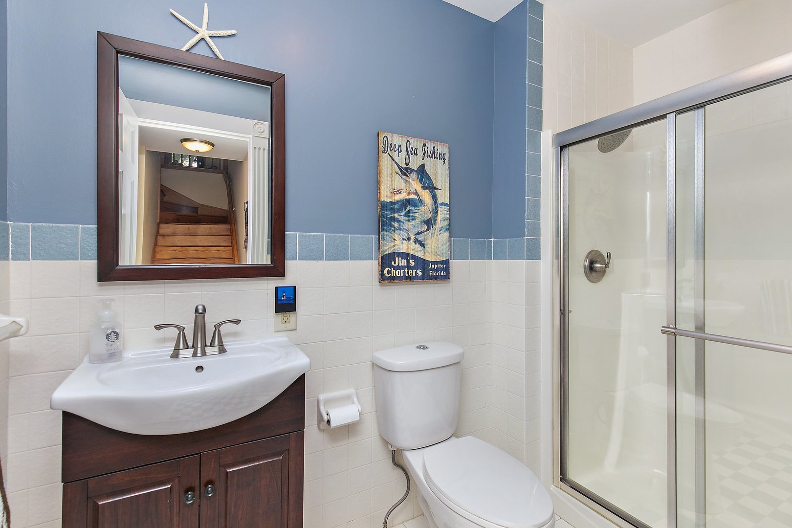 606 Old Hunt Road Fox River Grove, IL 60021 - Photo 15 of 35 a bathroom with a toilet sink and shower