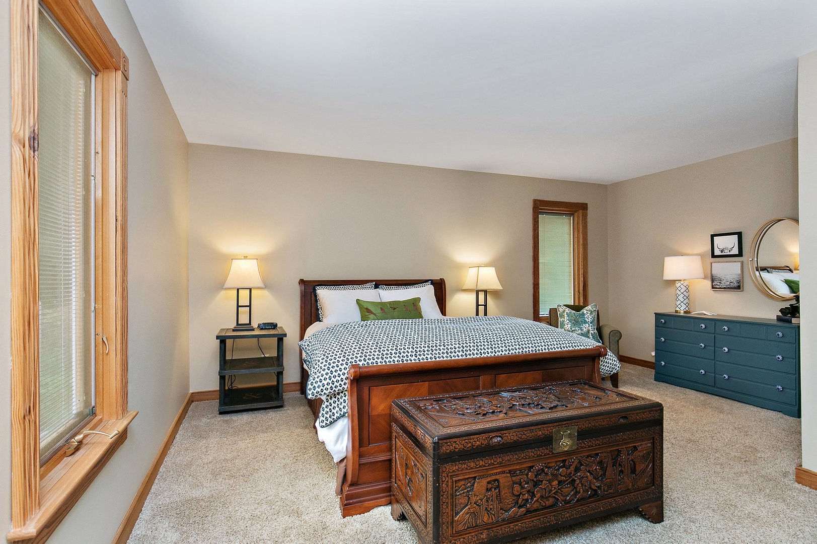 606 Old Hunt Road Fox River Grove, IL 60021 - Photo 19 of 35 a bedroom with a bed and a dresser in it