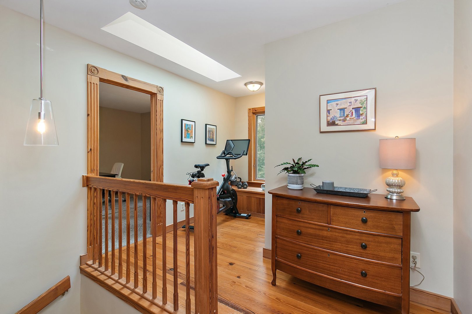 606 Old Hunt Road Fox River Grove, IL 60021 - Photo 20 of 35 a view of a hallway with a bed and a dresser