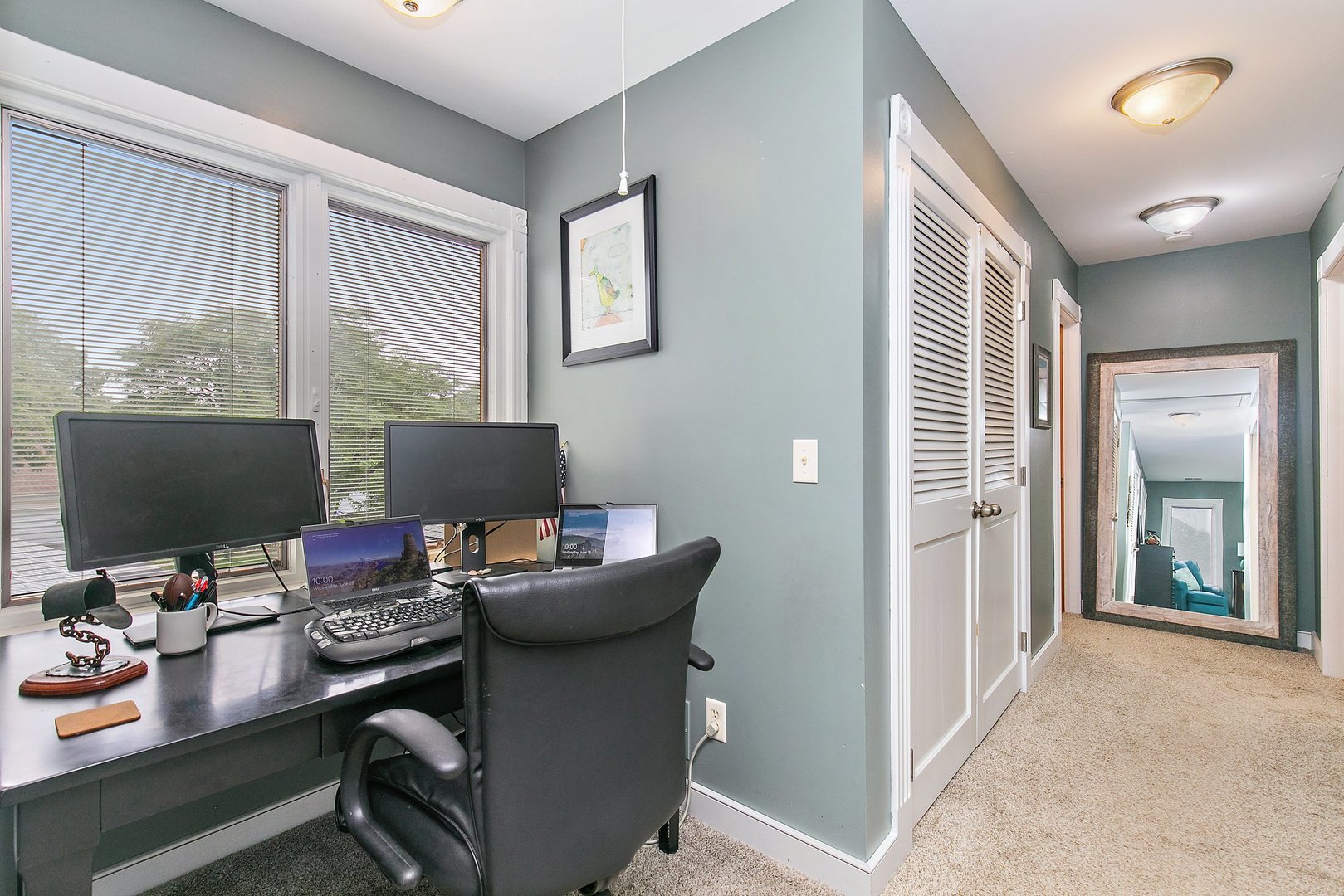606 Old Hunt Road Fox River Grove, IL 60021 - Photo 22 of 35 a workstation with a desk and chair with a workspace