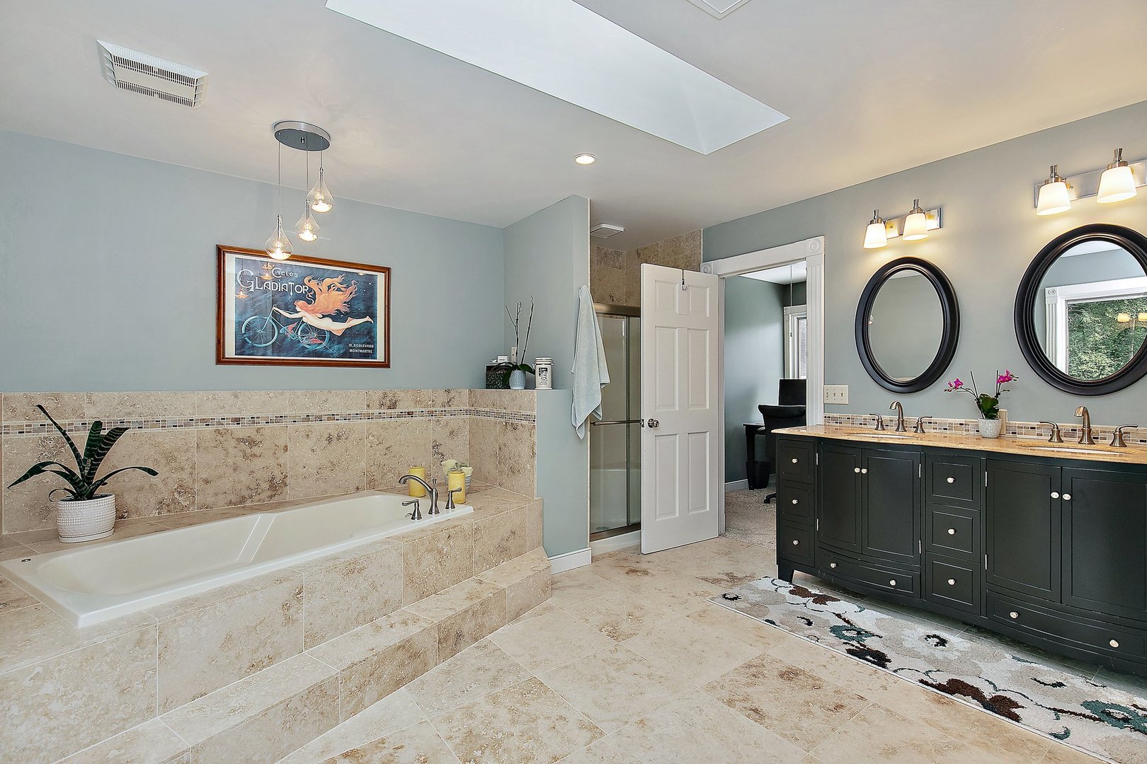 606 Old Hunt Road Fox River Grove, IL 60021 - Photo 24 of 35 a spacious bathroom with a tub sink and mirror