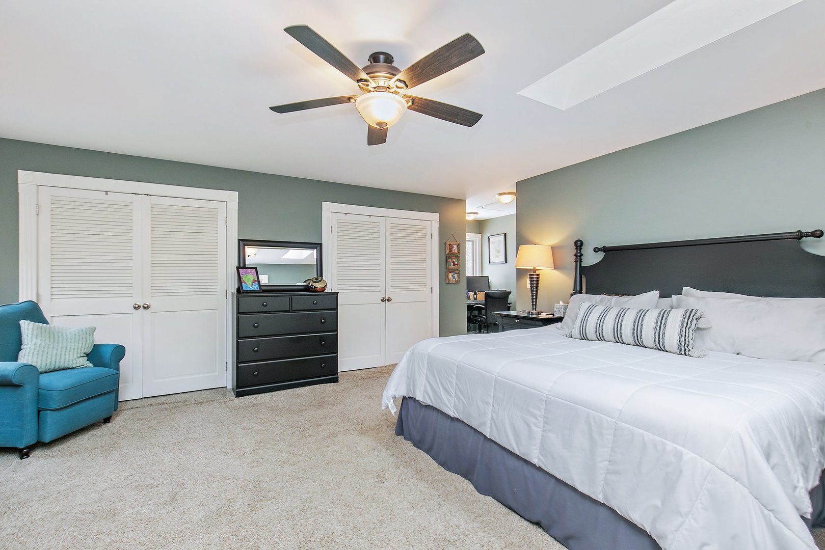 606 Old Hunt Road Fox River Grove, IL 60021 - Photo 26 of 35 a bedroom with a bed and a ceiling fan