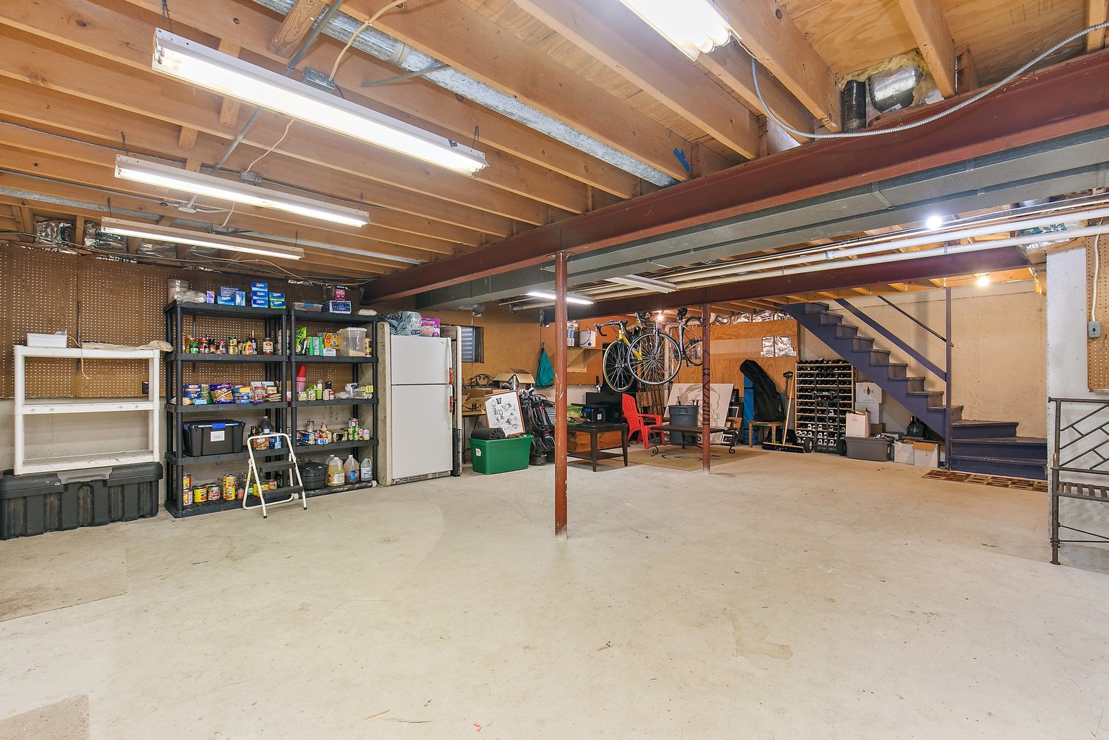 606 Old Hunt Road Fox River Grove, IL 60021 - Photo 29 of 35 a view of a room with wooden shelves