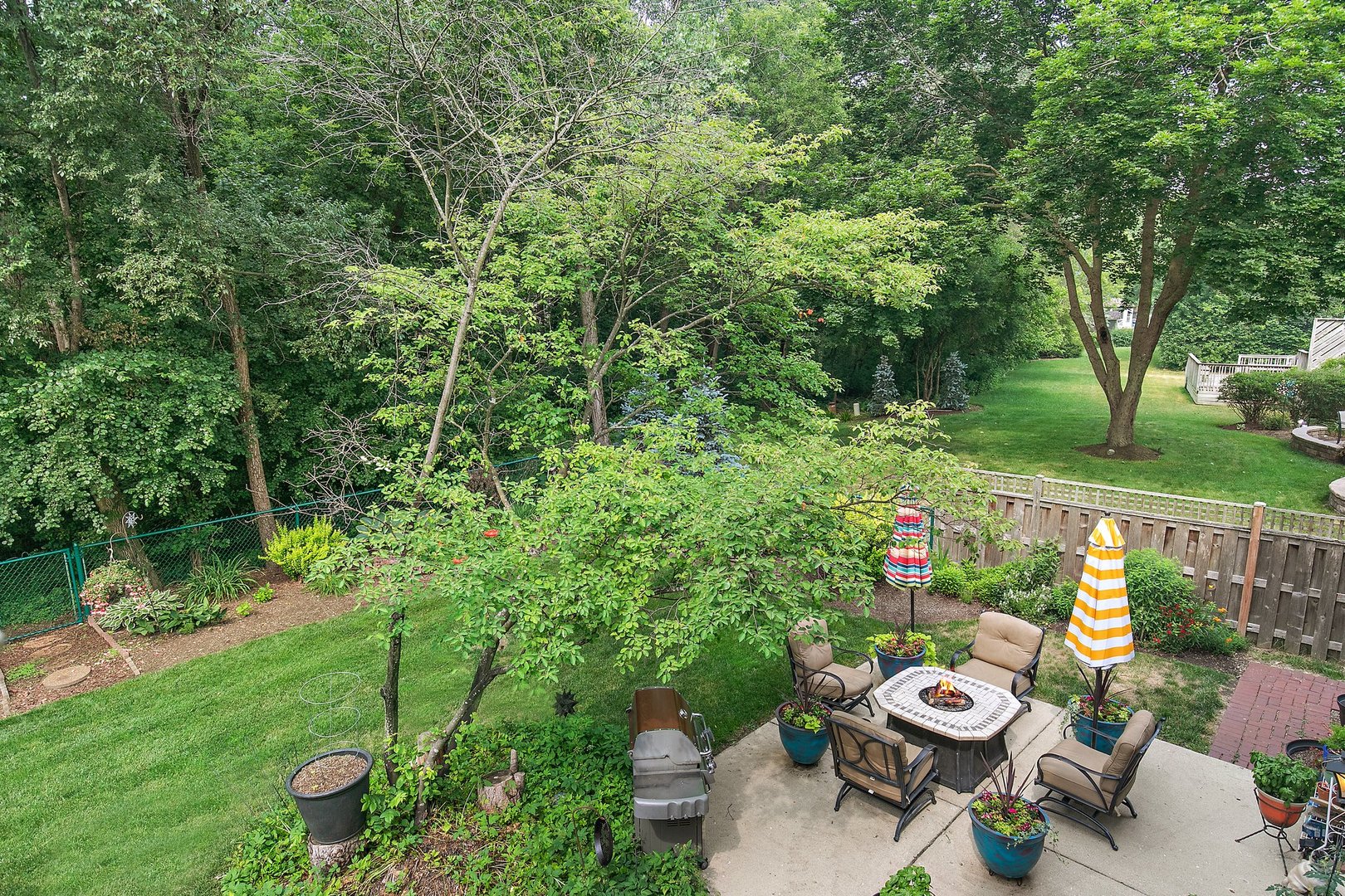 606 Old Hunt Road Fox River Grove, IL 60021 - Photo 32 of 35 a view of a chairs and fire pit in the yard