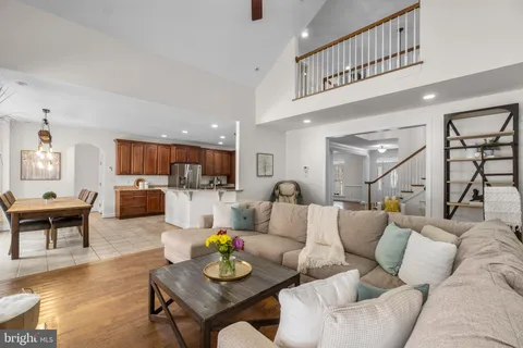 a bedroom with a bed and a lamp