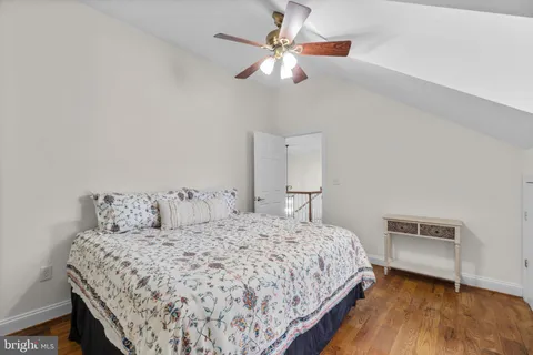 a bathroom with a sink toilet and a mirror